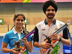 Manu Bhaker positioned herself for a second Olympic medal as she teamed up with Sarabjot Singh to secure a spot in the bronze playoff for the 10m air pistol mixed team event.