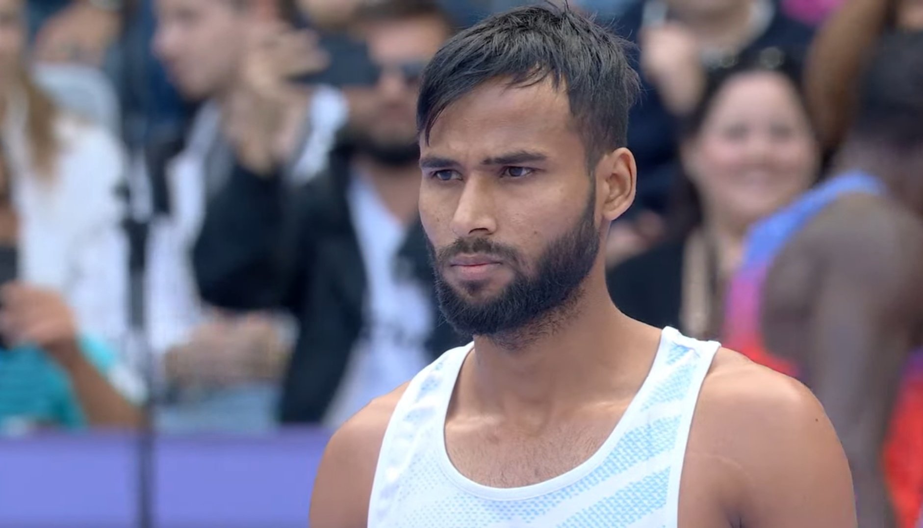 Praveen Kumar celebrates winning the gold medal in the men’s high jump T64 event at the 2024 Paris Paralympics.