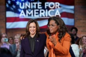 Kamala Harris speaking during Oprah Winfrey’s virtual "Unite for America" event, joined by emotional audience members and celebrity endorsements.