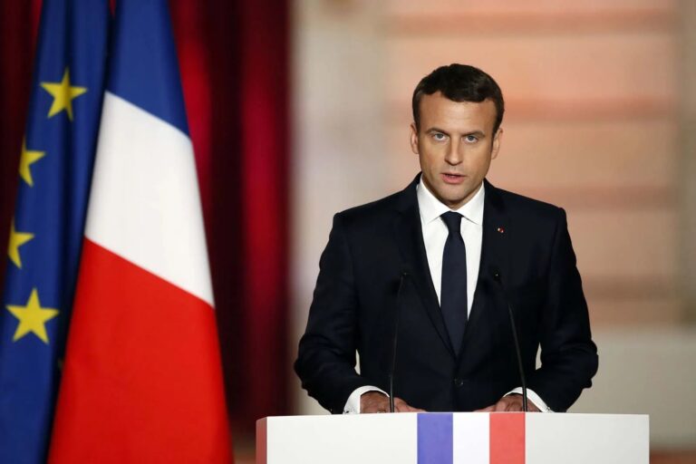 Emmanuel Macron speaking during a radio interview, discussing Gaza conflict.