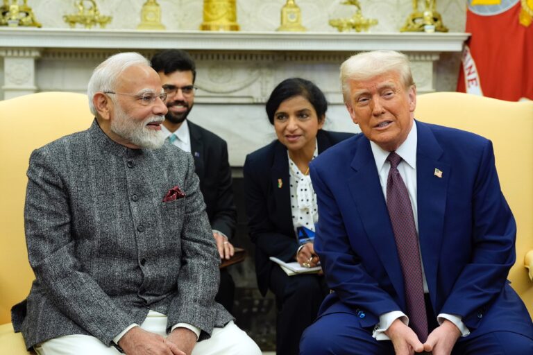 PM Modi and President Trump shake hands during their historic meeting at the White House.